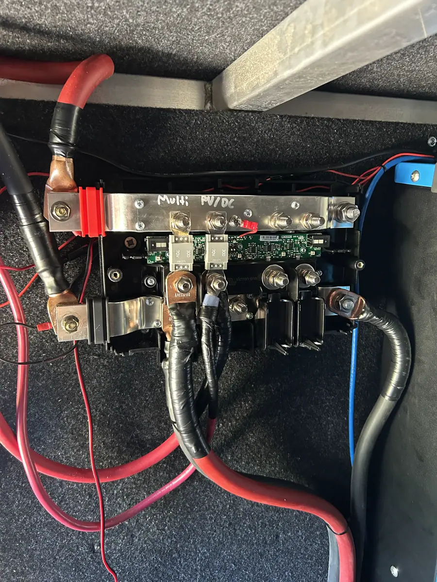 Close-up of a Victron Lynx Distributor with 300A fuses and heavy-gauge RV power cables.